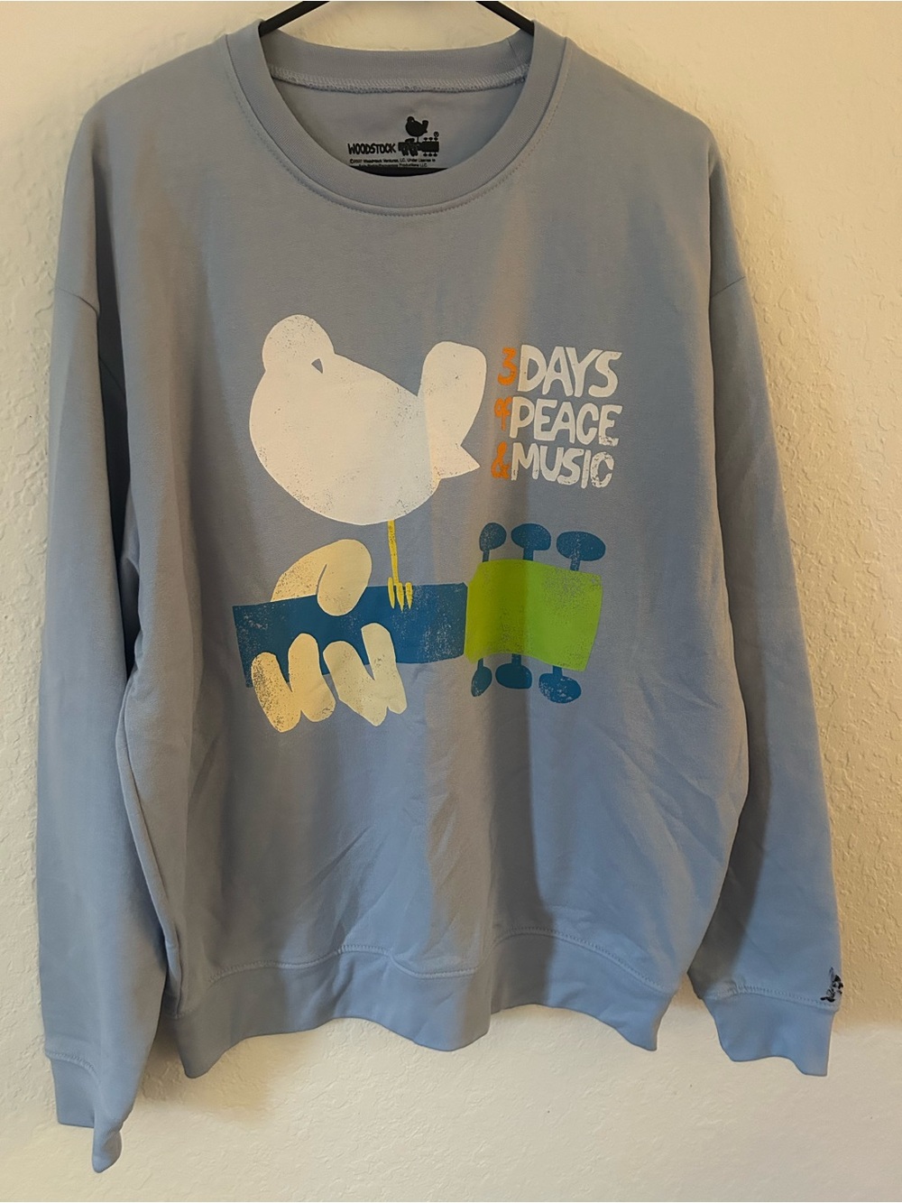 Woodstock 3 Days of Peace & Music Light Blue Graphic Sweatshirt